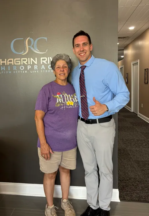 Dr. C.J. Levand with a patient