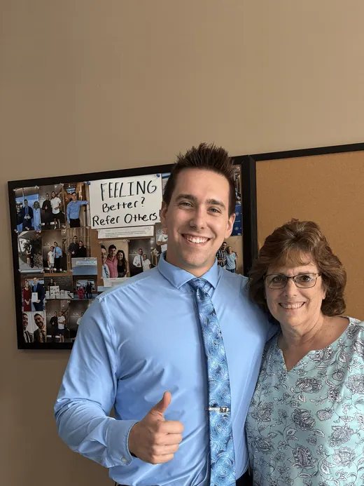 Dr. C.J. Levand with a patient