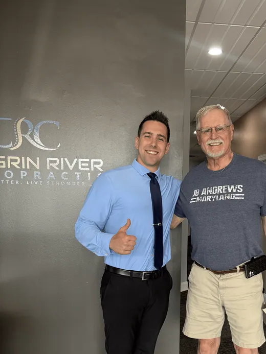 Dr. C.J. Levand with a patient