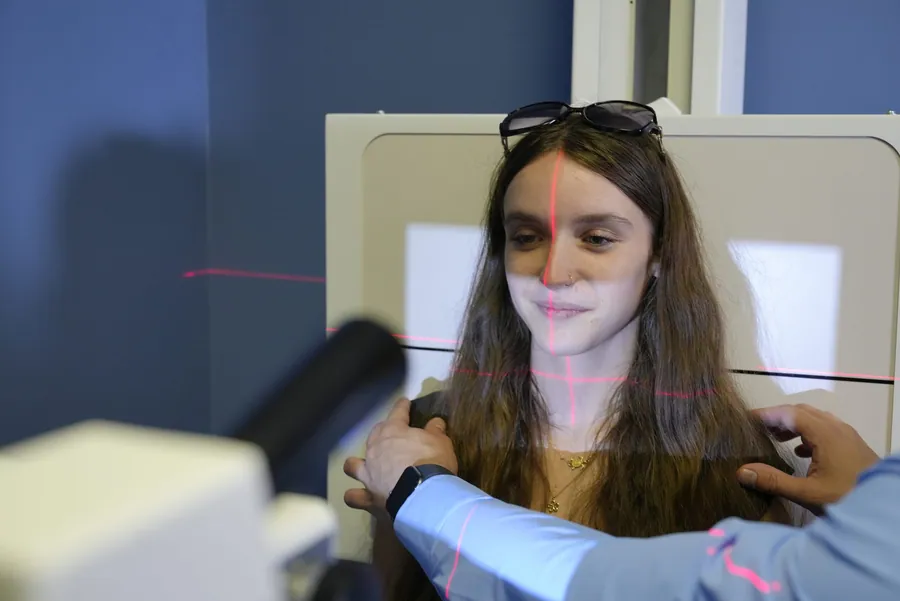 Patient positioned for a spine x-ray