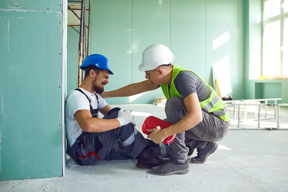 Construction worker recovering from a job site injury while seeking chiropractic care for workplace accident rehabilitation